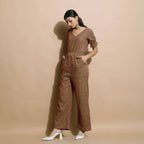 Left View of a Model wearing Handspun Frilled Sleeve Straight Jumpsuit