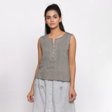 Front View of a Model wearing Handspun Grey Split Neck Sleeveless Top