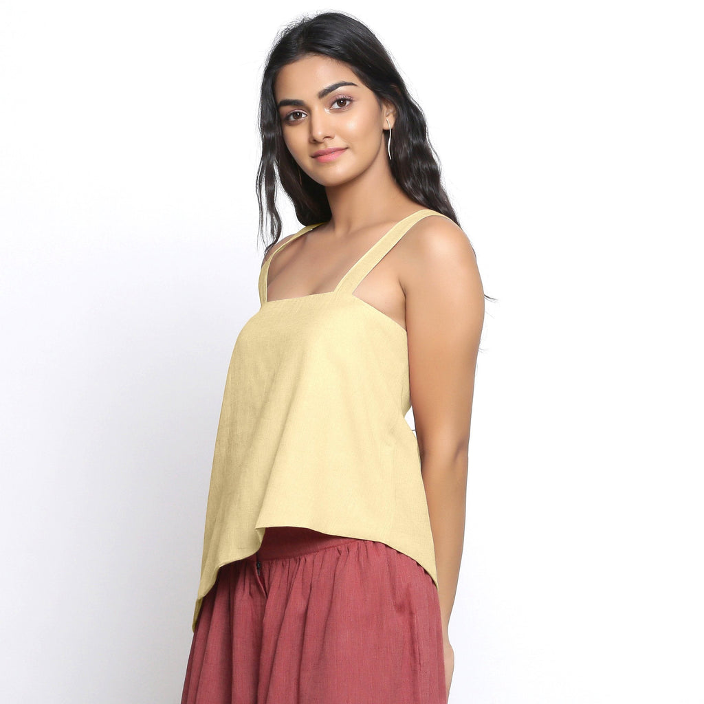 Left View of a Model wearing Handspun Light Yellow Asymmetrical Top