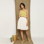 Front View of a Model wearing Handspun Light Yellow Balloon Top