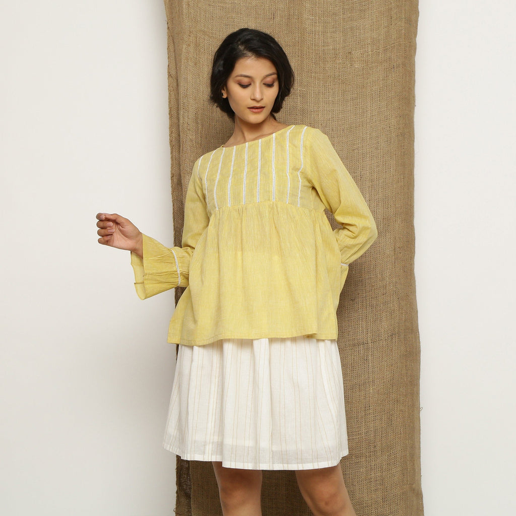 Front View of a Model wearing Handspun Light Yellow Poet Sleeve Top