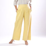 Front View of a Model wearing Handspun Light Yellow Wide Legged Pant