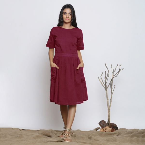 Front View of a Model wearing Handspun Maroon Backless Fit and Flare Dress