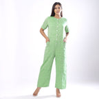 Front View of a Model wearing Handspun Mint Green Paneled Button-Down Jumpsuit