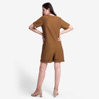 Back View of a Model wearing Handspun Oak Brown Button-Down Romper