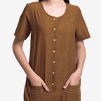 Front Detail of a Model wearing Handspun Oak Brown Button-Down Romper