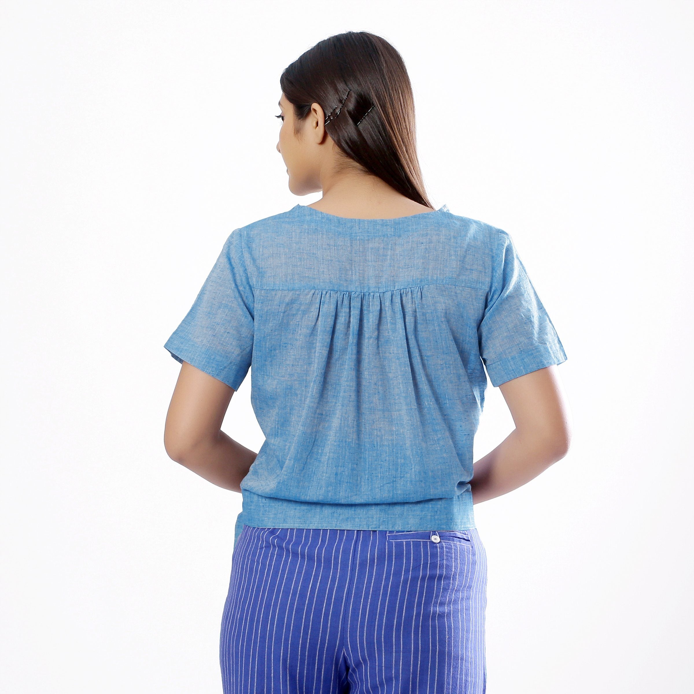 Back View of a Model wearing Handspun Sky Blue Wrap Top