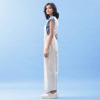 Left View of a Model wearing Handspun Vegetable Yarn Dyed Pinafore Jumpsuit