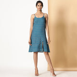 Front View of a Model wearing Teal Handwoven Cotton Ikat Knee Length Strappy Slit Dress