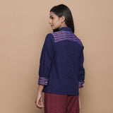 Back View of a Model wearing Ikat Handspun Cotton Navy Blue Shirt