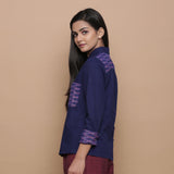 Left View of a Model wearing Ikat Handspun Cotton Navy Blue Shirt