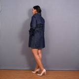 Left View of a Model wearing Indigo 100% Cotton Denim Double-Breasted Trench Coat