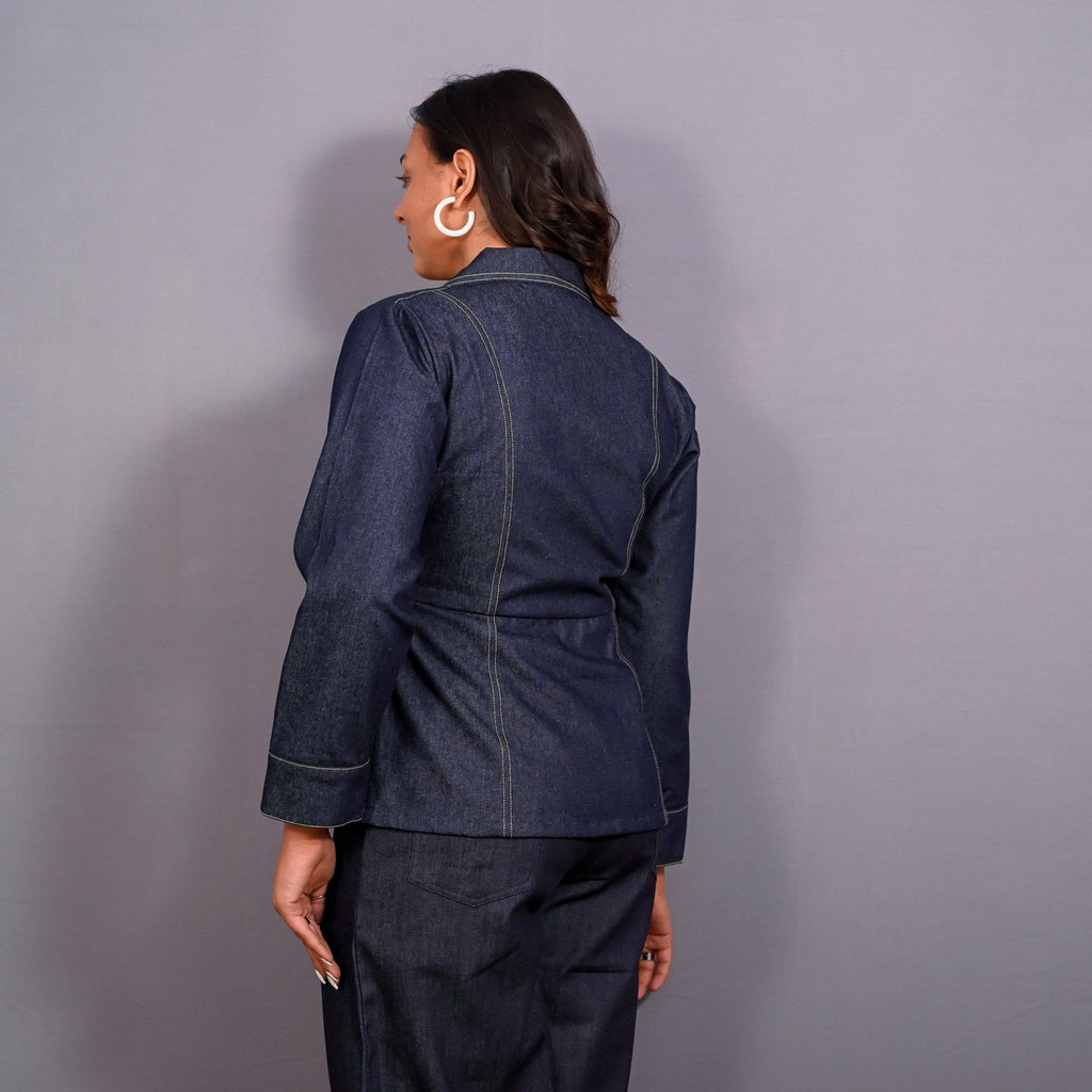 Back View of a Model wearing Indigo Cotton Denim Button-Down Peplum Top