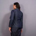 Back View of a Model wearing Indigo Cotton Denim Button-Down Peplum Top