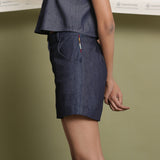 Left Detail of a Model wearing Indigo Cotton Denim Paneled Shorts