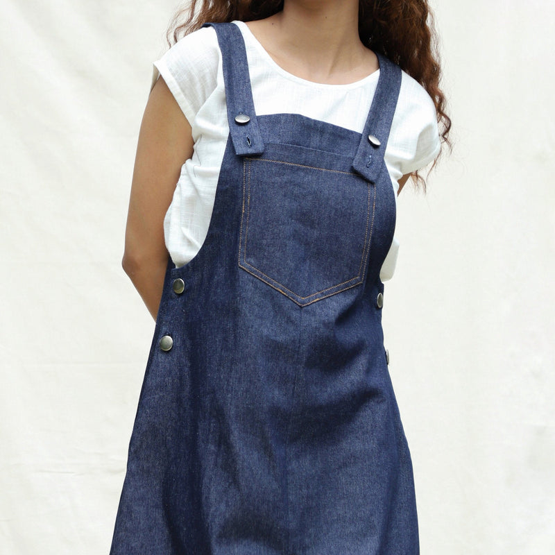 Front Detail of a Model wearing Indigo Cotton Denim Pinafore Knee Length Dress