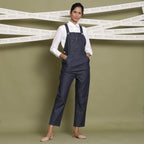 Front View of a Model wearing Indigo 100% Cotton Denim Strap Sleeve Dungaree