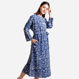 Right View of a Model wearing Indigo Dabu Block Print Floral Cotton Maxi Dress