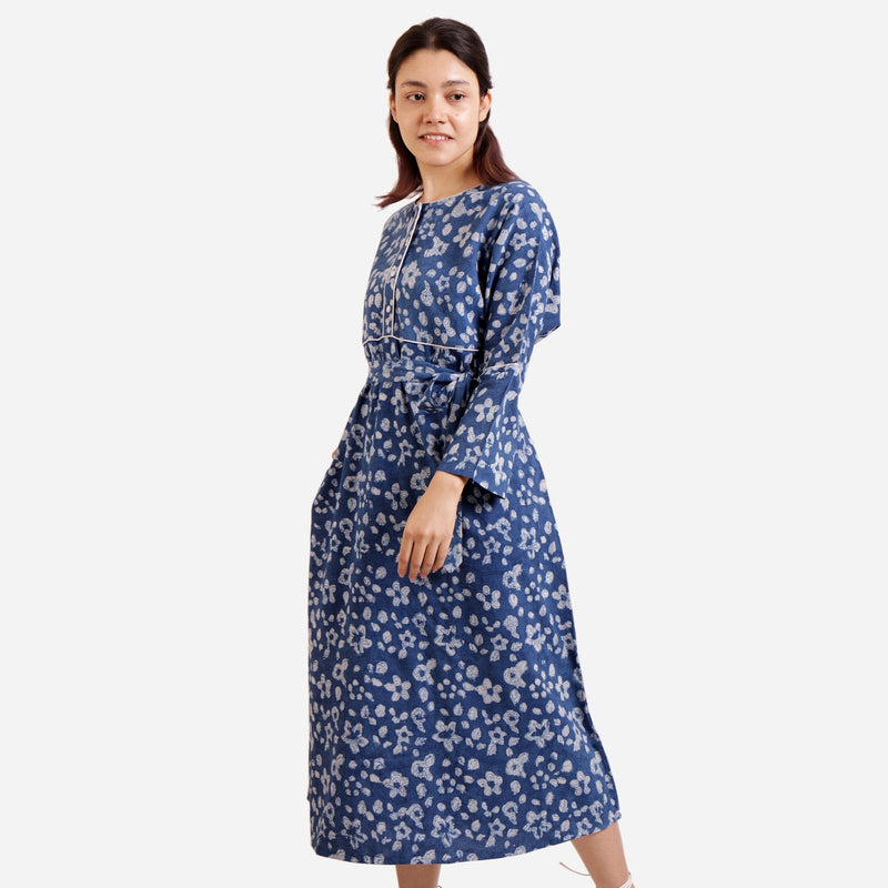 Left View of a Model wearing Indigo Dabu Block Print Floral Cotton Maxi Dress