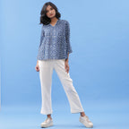 Front View of a Model wearing Indigo Dabu Hand Block Printed Flared Top