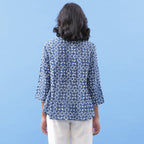 Back View of a Model wearing Indigo Dabu Hand Block Printed Flared Top