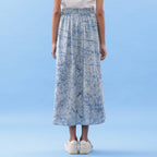 Back View of a Model wearing Indigo Dabu Printed Cotton Elasticated A-Line Maxi Skirt