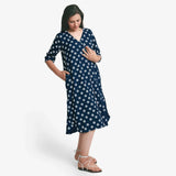 Right View of a Model wearing Indigo Polka Dot Block Print Cotton Midi Dress