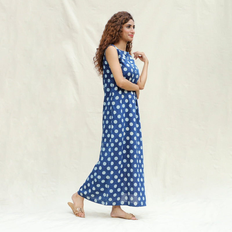 Right View of a Model wearing Indigo Polka Dot Block Printed Cotton Sleeveless Ankle Length Shift Dress