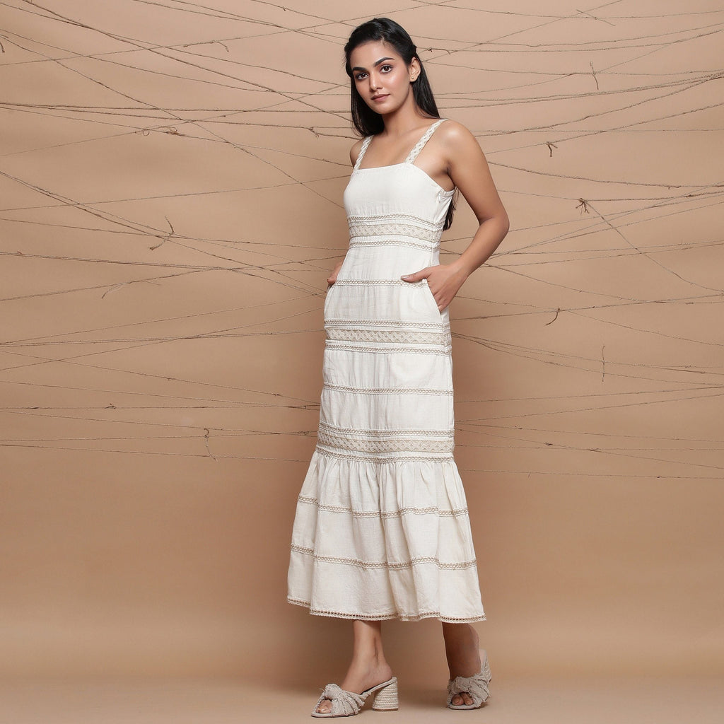Left View of a Model wearing Jute Laced Handspun Sheath Dress