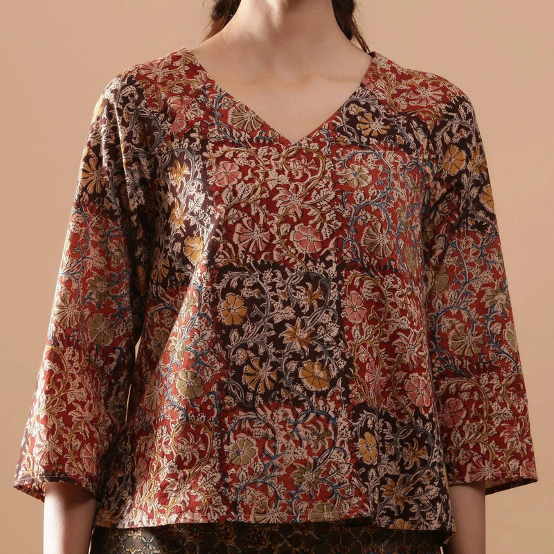 Front Detail of a Model wearing Muddy Red Kalamkari Raglan Sleeves Top