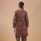 Back View of a Model wearing Reversible Quilted Kalamkari Jacket