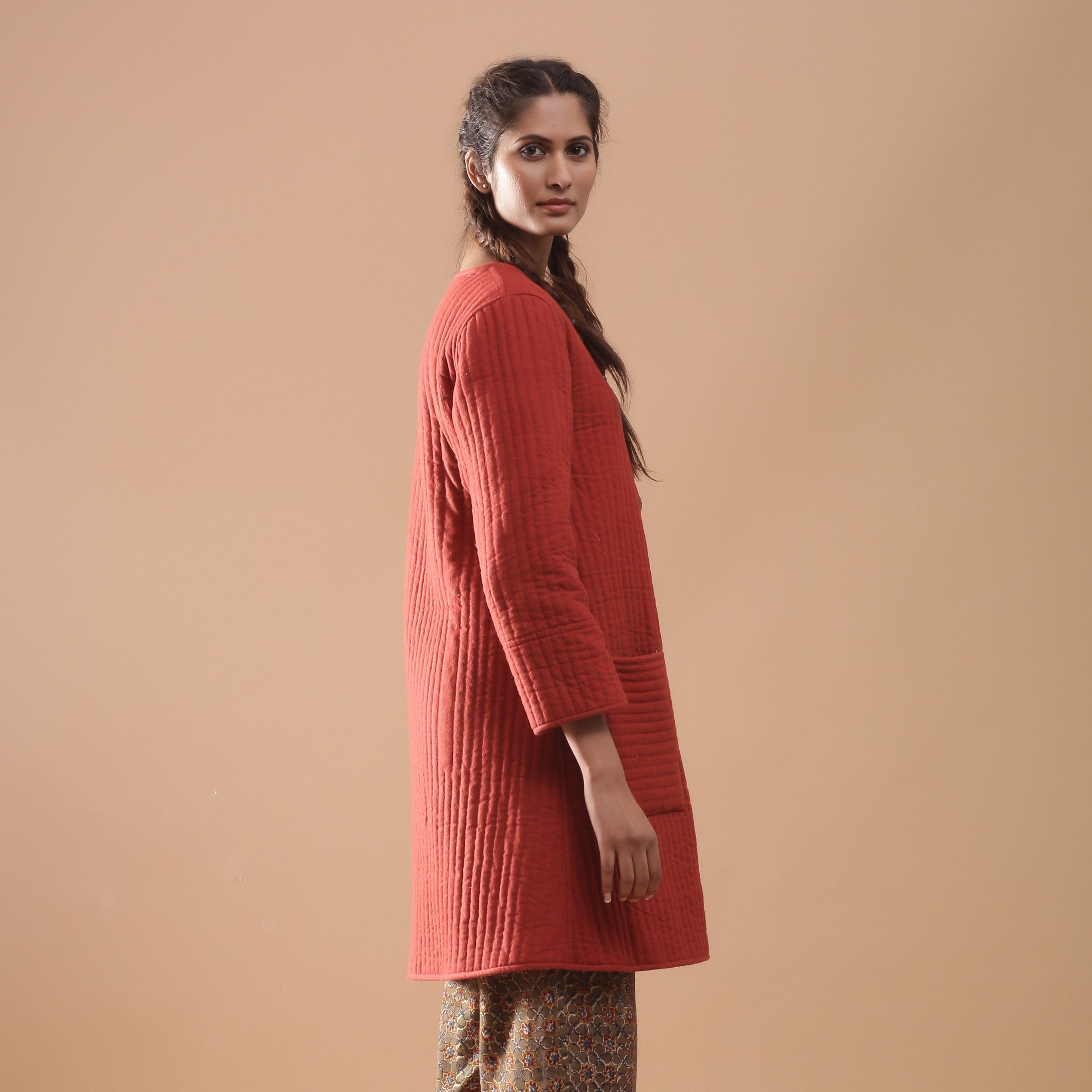 Right View of a Model wearing Reversible Quilted Kalamkari Jacket