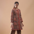 Right View of a Model wearing Reversible Quilted Kalamkari Jacket
