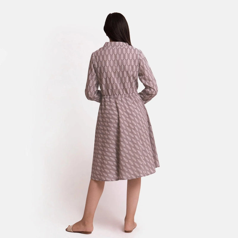 Back View of a Model wearing Kashish Botanical Pattern Button-Down Dress