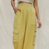 Front Detail of a Model wearing Khakhi Green Cotton Flax High-Rise Cargo Pant