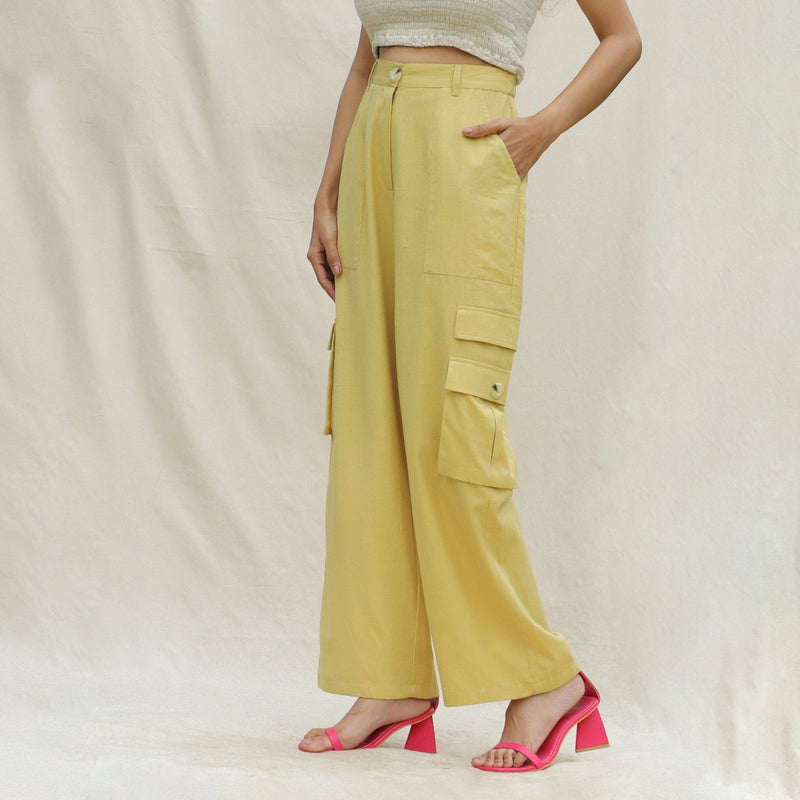Left View of a Model wearing Khakhi Green Cotton Flax High-Rise Cargo Pant