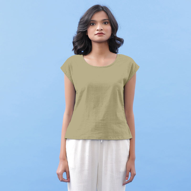 Front View of a Model wearing Khakhi Green Vegetable Dyed Handspun Cotton Essential Top