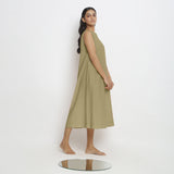 Right View of a Model wearing Khaki Green Vegetable Dyed A-Line Paneled Dress