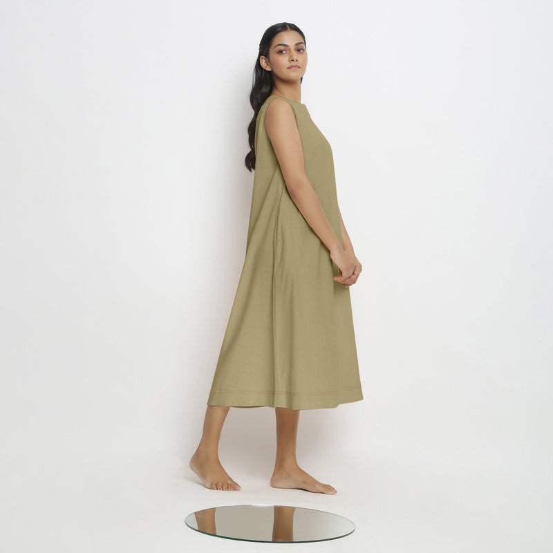 Right View of a Model wearing Khaki Green Vegetable Dyed A-Line Paneled Dress
