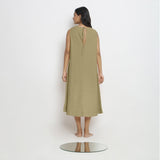 Back View of a Model wearing Khaki Green Vegetable Dyed A-Line Paneled Dress