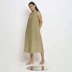 Left View of a Model wearing Khaki Green Vegetable Dyed A-Line Paneled Dress
