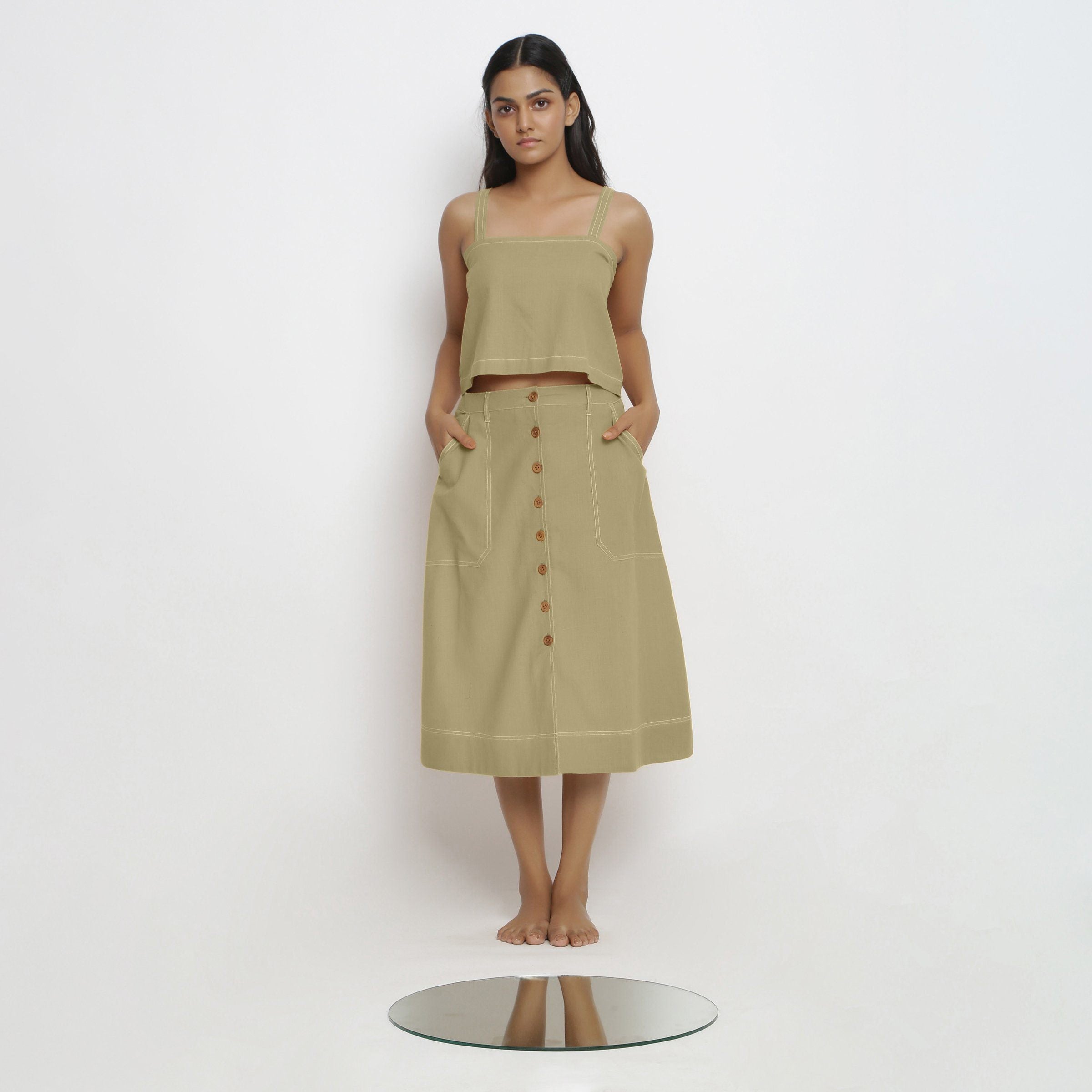 Front View of a Model wearing Khaki Green Vegetable Dyed Button-Down Skirt