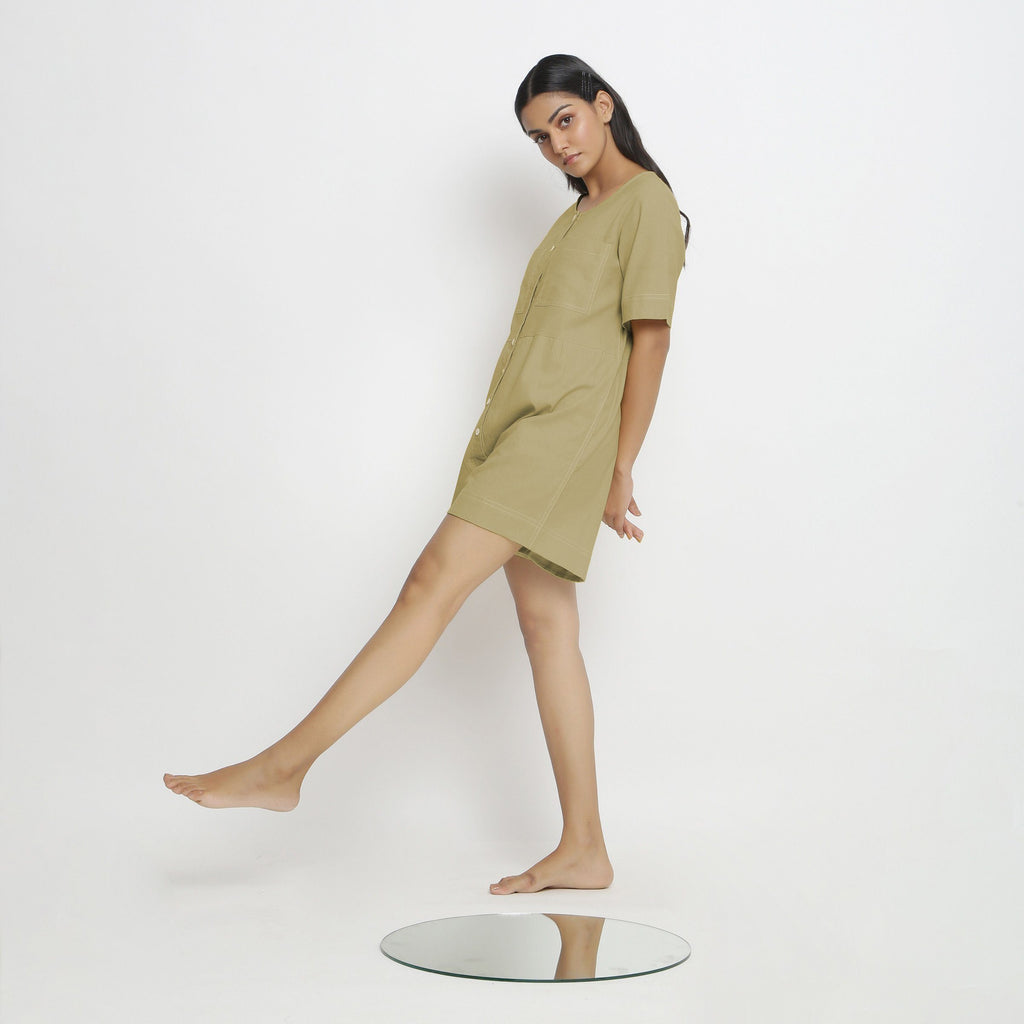 Left View of a Model wearing Khaki Green Vegetable Dyed Romper