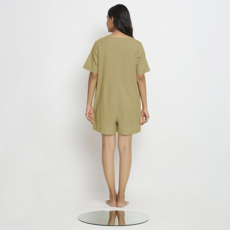 Back View of a Model wearing Khaki Green Vegetable Dyed Romper