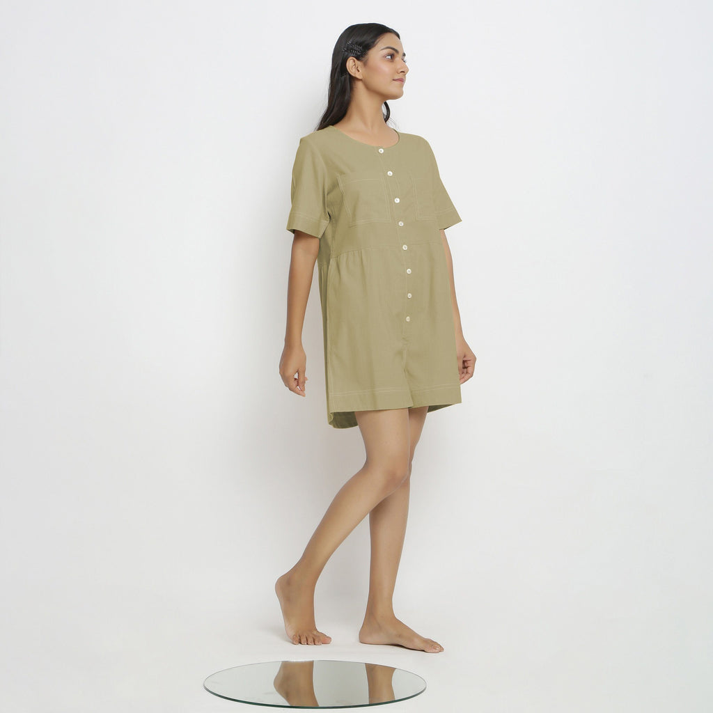 Right View of a Model wearing Khaki Green Vegetable Dyed Romper