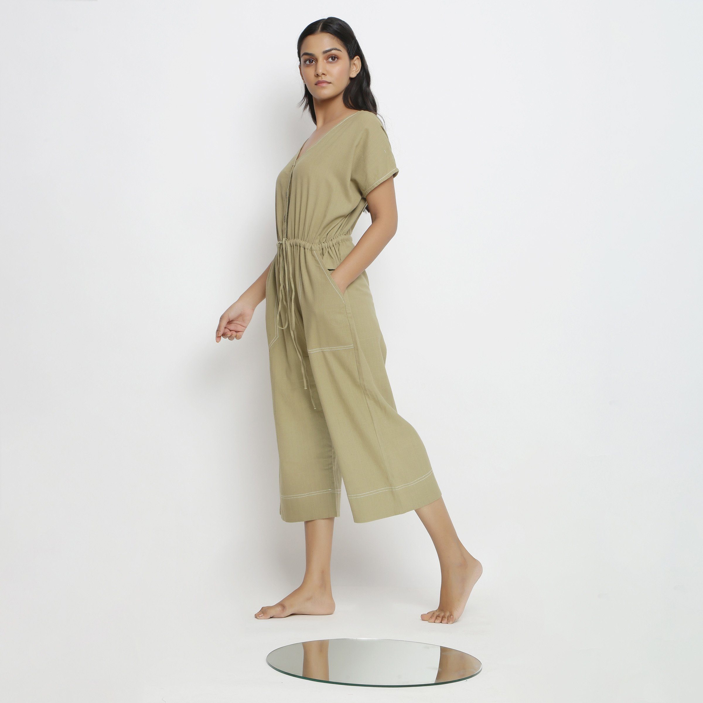 Left View of a Model Vegetable Dyed Button-Down Jumpsuit