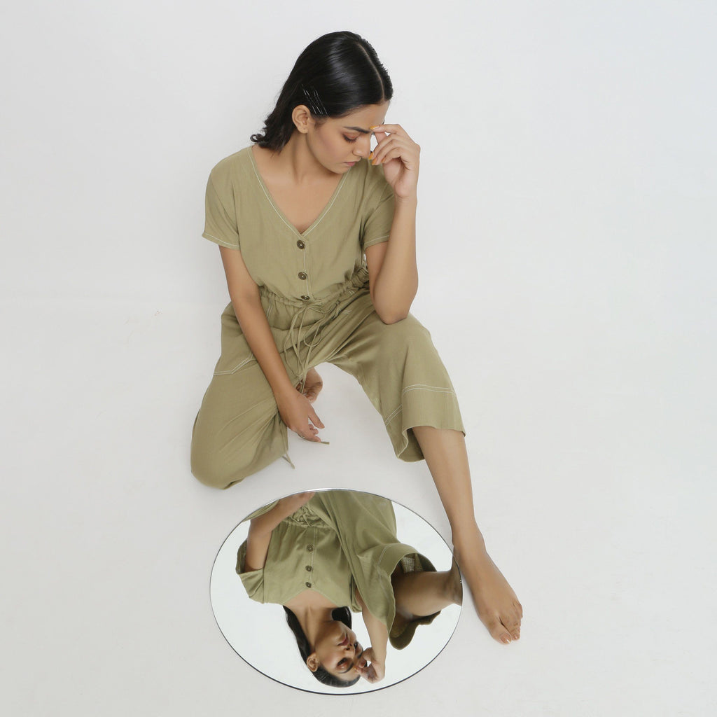 Front View of a Model wearing Vegetable Dyed Button-Down Jumpsuit