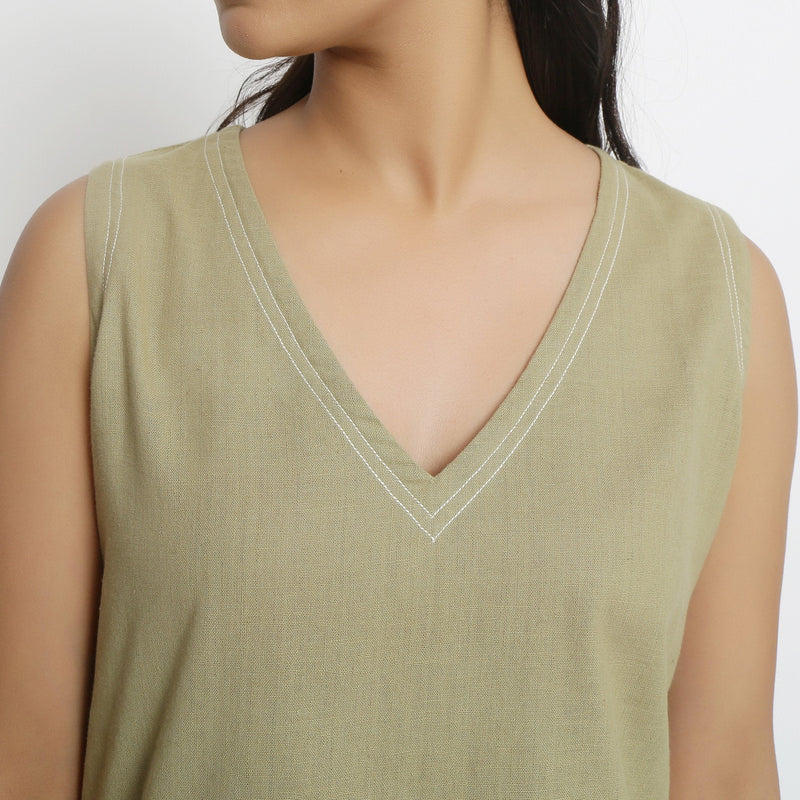 Front Detail of a Model wearing Khaki Green Vegetable Dyed Handspun Cotton Sleeveless Crop Top