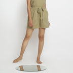 Front View of a Model wearing Khaki Green Vegetable Dyed Cotton Elasticated Short Shorts