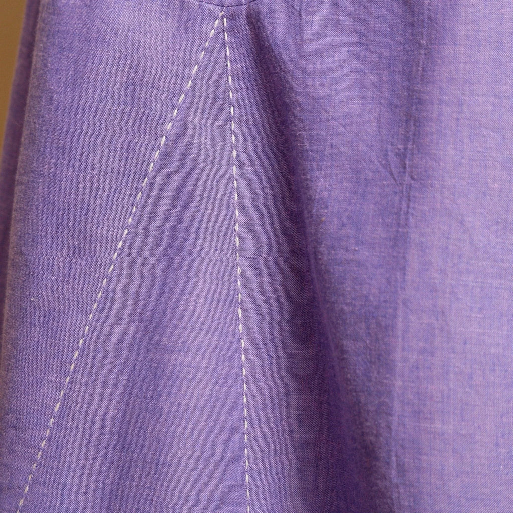 Close View of a Model wearing Lavender Hand-Embroidered Camisole Dress